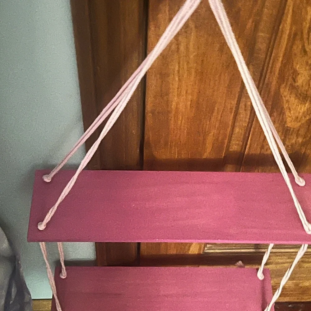Pink Geometric Display Shelves with Triangular Rope Design